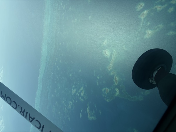 Reef seen through a small plane window